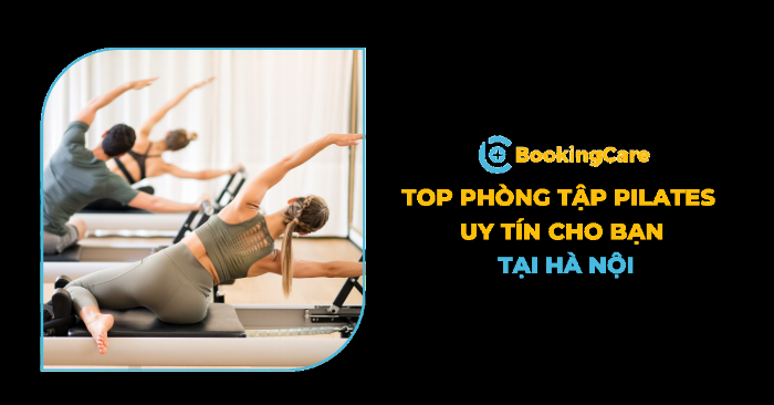 Một nhóm người đang tập yoga trong một lớp học, thực hiện các tư thế trên thảm, với không gian yên tĩnh và ánh sáng dịu nhẹ